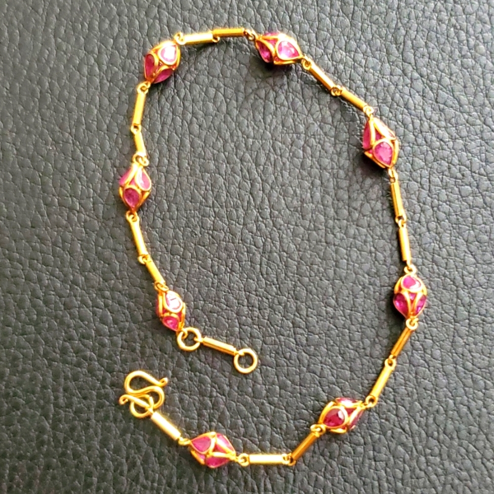 18k, Solid Gold Bracelet With Natural Rubies, shiny & Pretty on hand